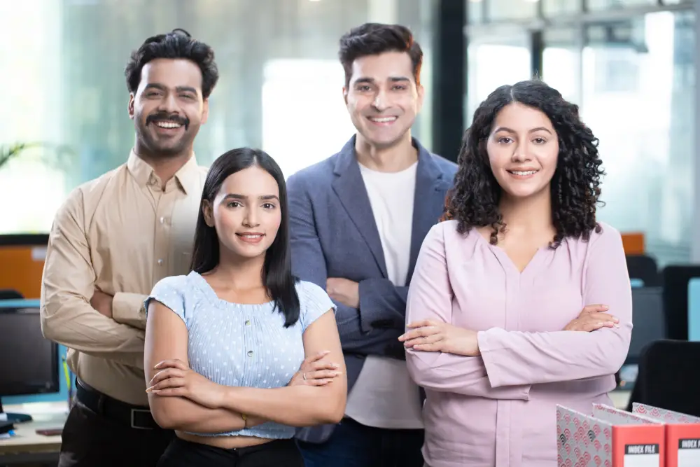 office employees are standing with folded hands