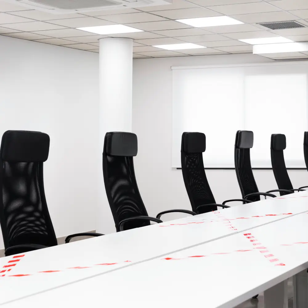 empty conference room with black chairs