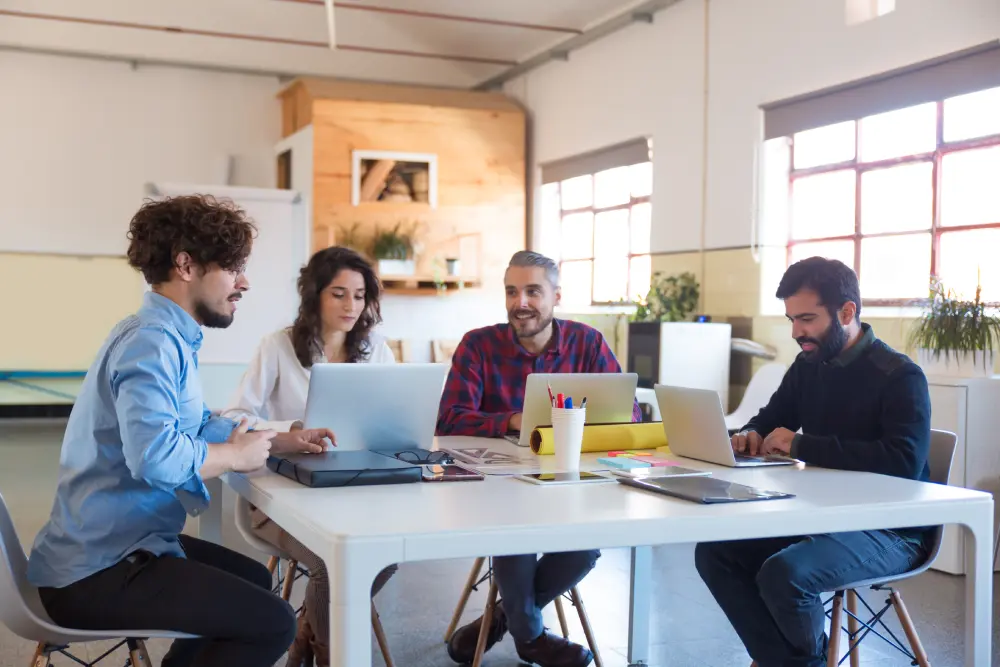 creative group working startup using laptops
